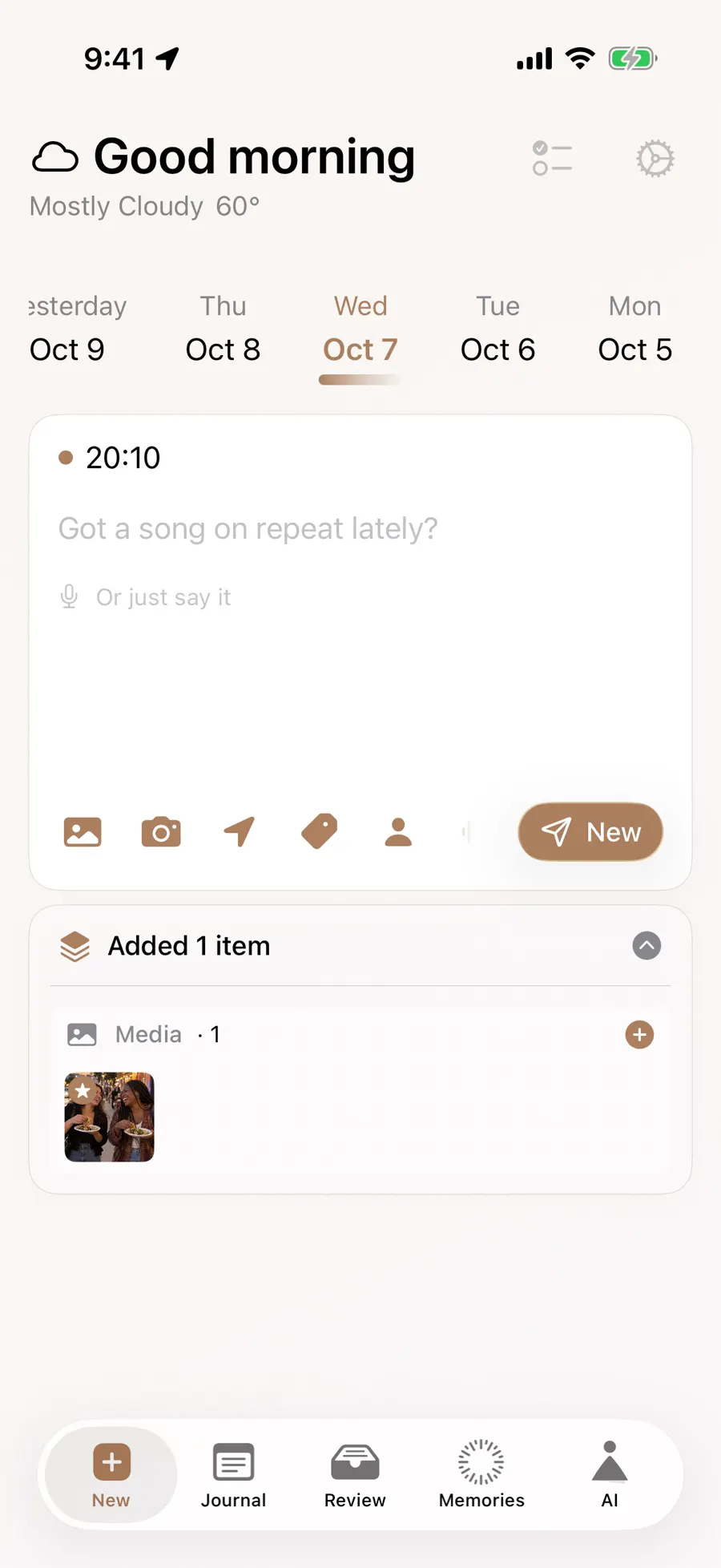 Writing page with a photo from the selected day among attached items
