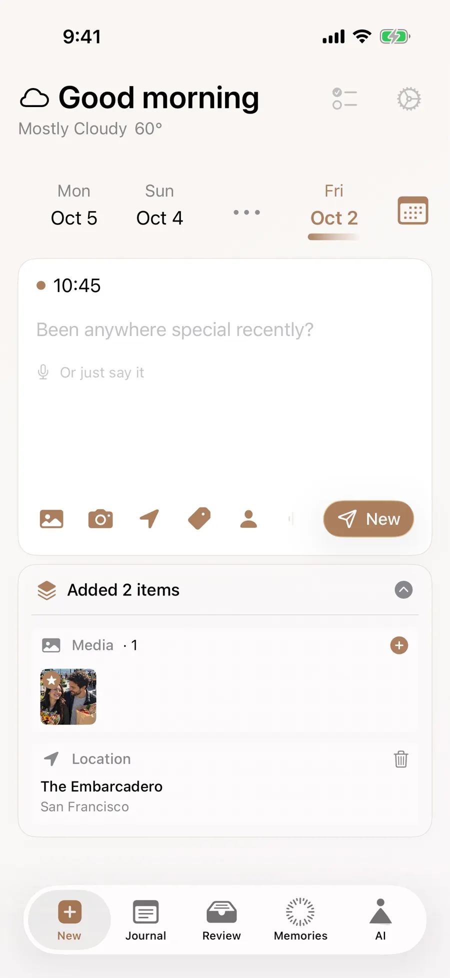 English entry editor with two selected photo thumbnails below the text area